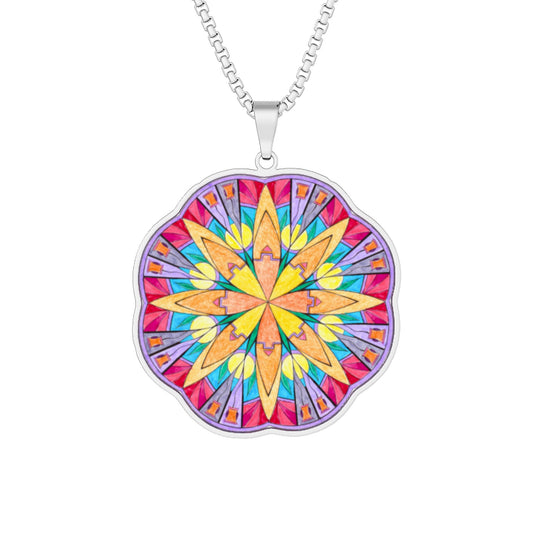 A silver chain necklace with a scalloped circular pendant featuring a vibrant, multicolored mandala design in shades of pink, yellow, orange, and purple.  Also available in Stainless steel and gold.