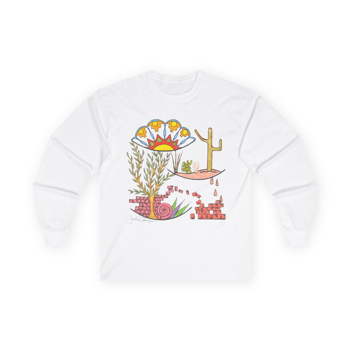 A white long-sleeve crewneck t-shirt featuring a colorful graphic print on the front with desert-themed illustrations including a cactus, flowers, and a tree.  Shirt available in different colors.