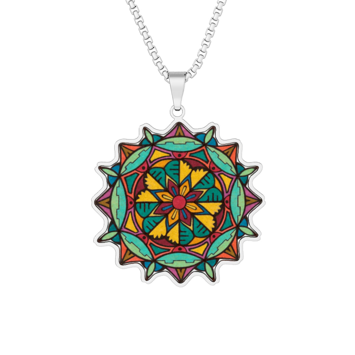 A silver chain necklace with a circular mandala pendant featuring a vibrant, multicolored geometric and floral design on a plain white background.  Also available in Gold and Stainless Steel.